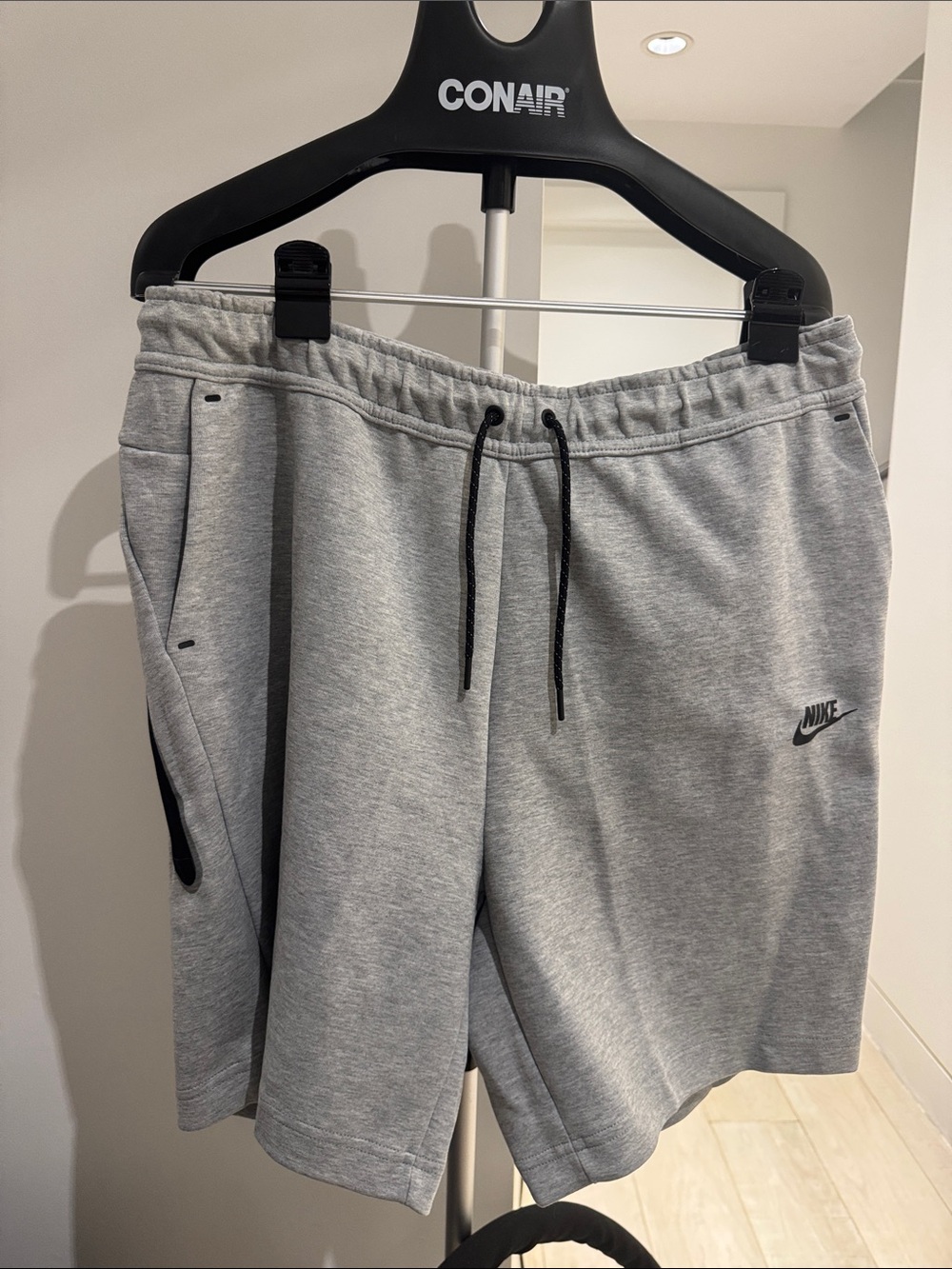 Nike Men's Light Gray Athletic Fleece Shorts with Black Drawstring